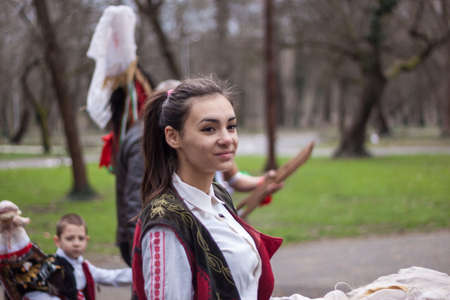 YAMBOL, BULGARIA - MARCH 08, 2015 - Kukerlandia - mask festival and masquerade games 08 March 2015. Bulgarian traditional dances and costumes called Kukeri.のeditorial素材