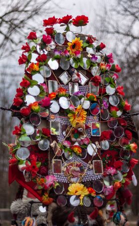 YAMBOL, BULGARIA - MARCH 08, 2015 - Kukerlandia - mask festival and masquerade games 08 March 2015. Bulgarian traditional dances and costumes called Kukeri.のeditorial素材