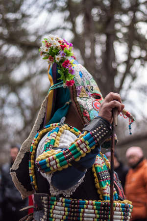 YAMBOL, BULGARIA - MARCH 08, 2015 - Kukerlandia - mask festival and masquerade games 08 March 2015. Bulgarian traditional dances and costumes called Kukeri.のeditorial素材
