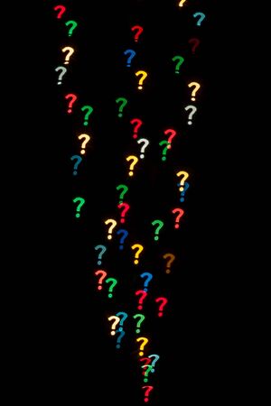 Question mark qustom bokeh created from decoration lights and isolated on black background.の写真素材