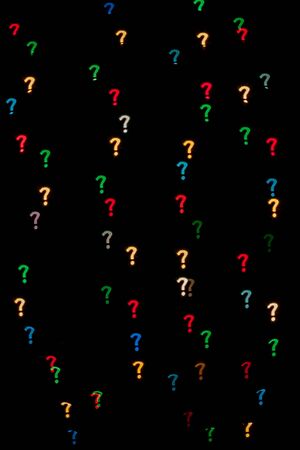 Question mark qustom bokeh created from decoration lights and isolated on black background.の写真素材