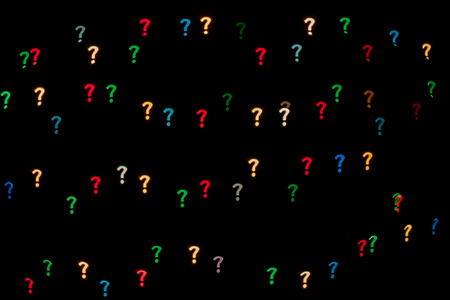 Question mark qustom bokeh created from decoration lights and isolated on black background.の写真素材