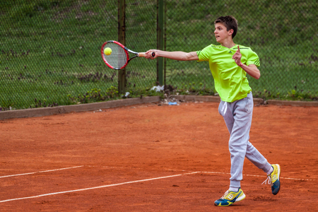 PAZARDZHIK, BULGARIA - APRIL 05, 2015 - Tennis tournament for children till 14 years of age - 05 April 2015. The competition was held on Pazardzhik tennis club courts.のeditorial素材