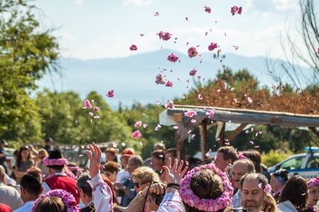 GORNO CHERKOVISHTE, BULGARIA - MAY 31, 2015 - Rose picking ritual in Gorno Izvorovo village. People dressed up in a traditional folklore costumes sing and dance for health and succesful harvest of the Bulgarian Roses.のeditorial素材