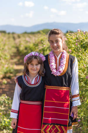 GORNO CHERKOVISHTE, BULGARIA - MAY 31, 2015 - Rose picking ritual in Gorno Izvorovo village. People dressed up in a traditional folklore costumes sing and dance for health and succesful harvest of the Bulgarian Roses.のeditorial素材
