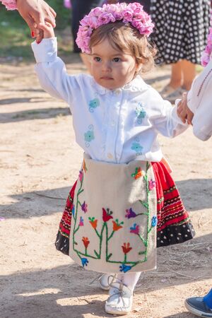 GORNO CHERKOVISHTE, BULGARIA - MAY 31, 2015 - Rose picking ritual in Gorno Izvorovo village. People dressed up in a traditional folklore costumes sing and dance for health and succesful harvest of the Bulgarian Roses.のeditorial素材