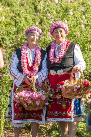 GORNO CHERKOVISHTE, BULGARIA - MAY 31, 2015 - Rose picking ritual in Gorno Izvorovo village. People dressed up in a traditional folklore costumes sing and dance for health and succesful harvest of the Bulgarian Roses.のeditorial素材