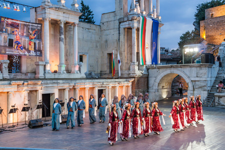 PLOVDIV, BULGARIA - AUGUST 06, 2015 - 21-st international folklore festival in Plovdiv, Bulgaria. The folklore group from Turkey dressed in traditional clothing is preforming Turkish national dances.のeditorial素材