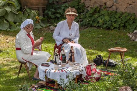 KOPRIVSHTITSA, BULGARIA - AUGUST 08, 2015 - National Festival of the Bulgarian Folklore in Koprivshtitsa, Bulgaria. Folklore groups from different cities dressed in traditional clothing are preforming Bulgarian national dances.のeditorial素材