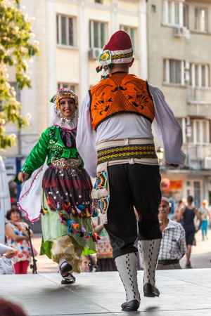 PLOVDIV, BULGARIA - AUGUST 06, 2015 - 21-st international folklore festival in Plovdiv, Bulgaria. The folklore group from Turkey dressed in traditional clothing is preforming Turkish national dances.のeditorial素材