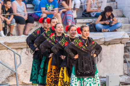 PLOVDIV, BULGARIA - AUGUST 06, 2015 - 21-st international folklore festival in Plovdiv, Bulgaria. The folklore group from Spain dressed in traditional clothing is preforming Spanish national dances.のeditorial素材