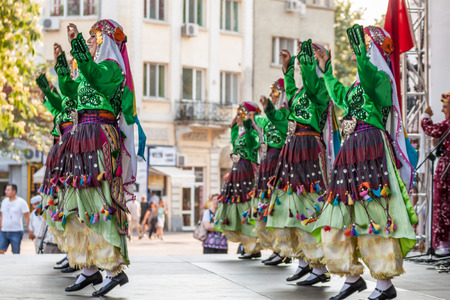 PLOVDIV, BULGARIA - AUGUST 06, 2015 - 21-st international folklore festival in Plovdiv, Bulgaria. The folklore group from Turkey dressed in traditional clothing is preforming Turkish national dances.のeditorial素材
