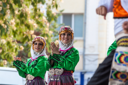 PLOVDIV, BULGARIA - AUGUST 06, 2015 - 21-st international folklore festival in Plovdiv, Bulgaria. The folklore group from Turkey dressed in traditional clothing is preforming Turkish national dances.のeditorial素材