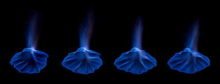 Ice cube on fire with blue flames isolated on black backgroundの写真素材