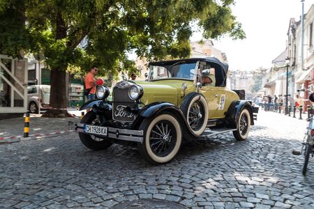 PLOVDIV, BULGARIA - SEPTEMBER 19, 2015 - Kapana street festival in Plovdiv, Bulgaria. Retro car parade and exhibition on the streets of Kapana area in Plovdiv city.のeditorial素材