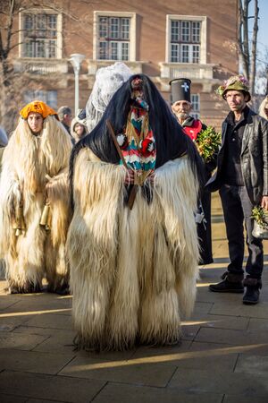 PERNIK, BULGARIA - JANUARY 30, 2016 - Masquerade festival Surva in Pernik, Bulgaria. People with...