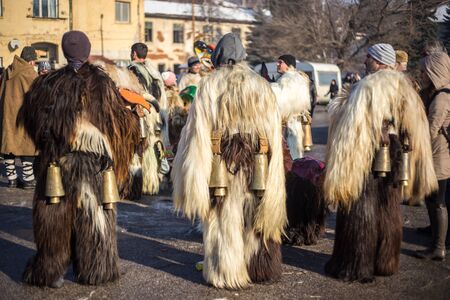 PERNIK, BULGARIA - JANUARY 30, 2016 - Masquerade festival Surva in Pernik, Bulgaria. People with mask called Kukeri dance and preform to scare the evel spirits.のeditorial素材