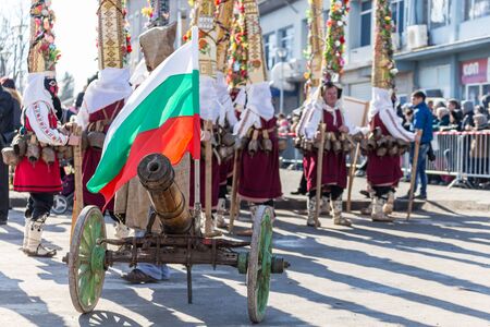 RAKOVSKI, BULGARIA - FEBRUARY 06, 2015 - Kukeri festival in Rakovski, Bulgaria. People dressed in different costumes dance and preform rituals to scare the evel spirits.のeditorial素材