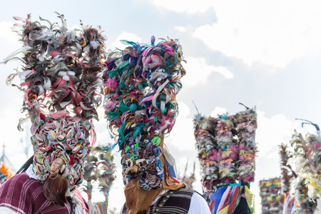 RAKOVSKI, BULGARIA - FEBRUARY 06, 2015 - Kukeri festival in Rakovski, Bulgaria. People dressed in different costumes dance and preform rituals to scare the evel spirits.のeditorial素材