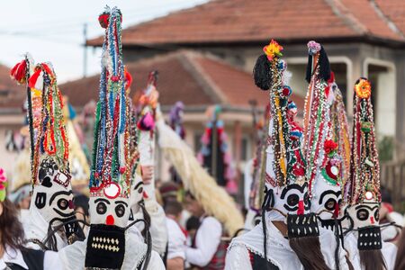 RAKOVSKI, BULGARIA - FEBRUARY 06, 2015 - Kukeri festival in Rakovski, Bulgaria. People dressed in different costumes dance and preform rituals to scare the evel spirits.のeditorial素材