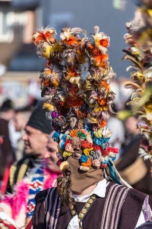 RAKOVSKI, BULGARIA - FEBRUARY 06, 2015 - Kukeri festival in Rakovski, Bulgaria. People dressed in different costumes dance and preform rituals to scare the evel spirits.のeditorial素材