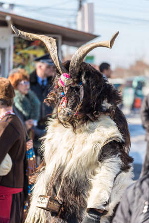 RAKOVSKI, BULGARIA - FEBRUARY 06, 2015 - Kukeri festival in Rakovski, Bulgaria. People dressed in different costumes dance and preform rituals to scare the evel spirits.のeditorial素材