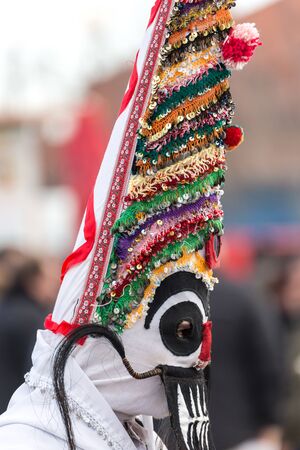 RAKOVSKI, BULGARIA - FEBRUARY 06, 2015 - Kukeri festival in Rakovski, Bulgaria. People dressed in different costumes dance and preform rituals to scare the evel spirits.のeditorial素材