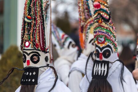 RAKOVSKI, BULGARIA - FEBRUARY 06, 2015 - Kukeri festival in Rakovski, Bulgaria. People dressed in different costumes dance and preform rituals to scare the evel spirits.のeditorial素材
