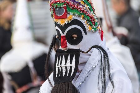RAKOVSKI, BULGARIA - FEBRUARY 06, 2015 - Kukeri festival in Rakovski, Bulgaria. People dressed in different costumes dance and preform rituals to scare the evel spirits.のeditorial素材