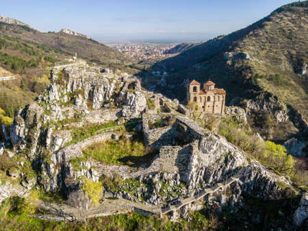 Areal veiw of the Asen's fortress and the Virgin Mary church with Asenovgrad city in the background.のeditorial素材