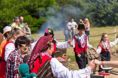 GORNO IZVOROVO, BULGARIA - MAY 29, 2016 - Bulgarian annual Rose picking ritual. People singing and dancing dressed in traditional clothing.のeditorial素材
