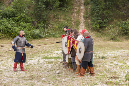 ASENVOGRAD, BULGARIA - JUNE 25, 2016 - Medieval fair in Asenovgrad recreating the life of Bulgarians during the Middle ages. Man demonstrating an attack with a spear.のeditorial素材