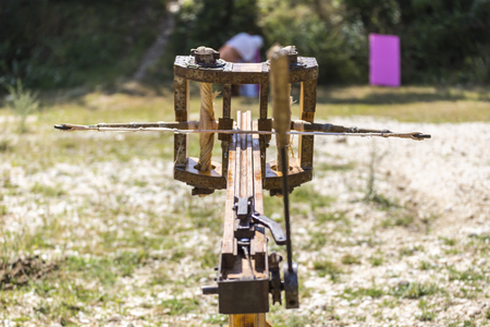 ASENVOGRAD, BULGARIA - JUNE 25, 2016 - Medieval fair in Asenovgrad recreating the life of Bulgarians during the Middle ages. Demonstrating and firing an arrow from a ballista.のeditorial素材