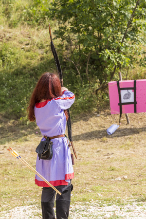 ASENVOGRAD, BULGARIA - JUNE 25, 2016 - Medieval fair in Asenovgrad recreating the life of Bulgarians during the Middle ages. Bow and arrow shooting contest.のeditorial素材