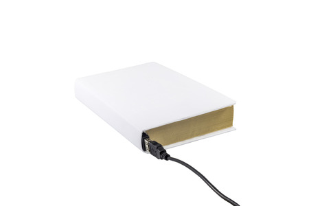 Book with blank cover connected to an USB cableの写真素材