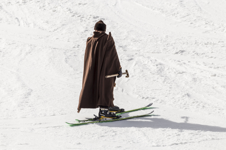 PAMPOROVO, BULGARIA - MARCH 03, 2017 - Skiing with Bulgarian flags at Pamporovo, Bulgaria. People dressed with traditional bulgarian clothes skiing with the national flag.のeditorial素材