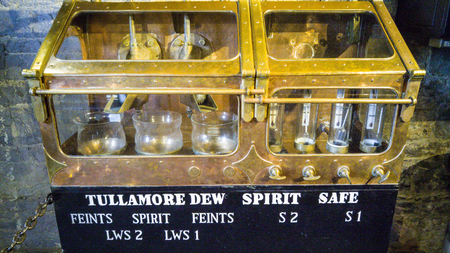TULLAMORE, IRELAND - MARCH 18, 2017 - Tullamore Dew storehouse brewery in Tullamore, Ireland. Showcasing different stages of distilling the Tullamore Dew whiskey and tasting it.のeditorial素材