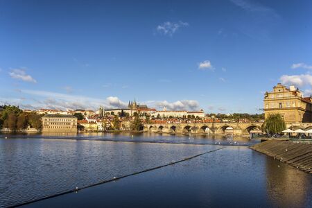 Amazing blue sky over the famous Charles bridge over the Vltava river in Pragueの写真素材