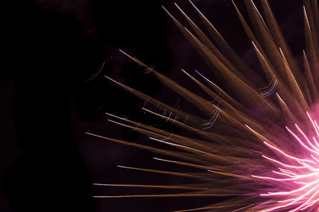 Close-up of a fireworks display. Unique forms and patterns on black background.の写真素材