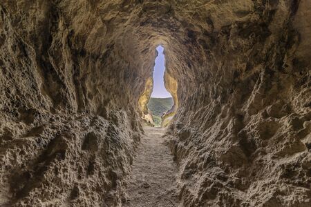 The womb cave also known as Utroba cave near Kardzhali city in Rhodope mountain in Bulgariaの写真素材