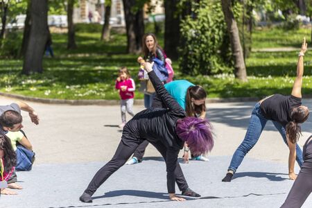 PLOVDIV, BULGARIA - APRIL 21, 2019 - Port de Bras ballet dance demonstration in a park in Plovdiv city Bulgariaのeditorial素材