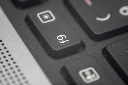 Extreme macro of the f9 key on a laptop keyboardの写真素材