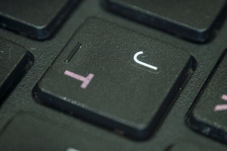 Extreme macro of the letter J on a laptop keyboardの写真素材
