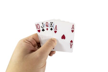 POV view of a man holding playing cards in his hands isolated on white background. Gambling concept.