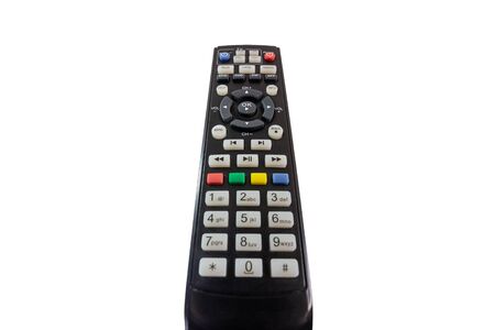 Person poining a TV remote and pressing the power button isolated on white backgroundの写真素材