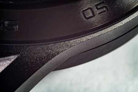 Extreme macro shot of a metal smartmatch with numbers on the sideの写真素材
