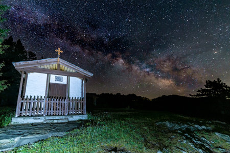 Chapel St. Peter and Paul near Momchilovtsi village in Bulgaria with the Milky way in the background