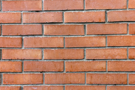 smooth and red brick wallの写真素材