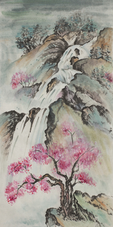 Mountain landscape with cherry blossoms and a waterfallの写真素材