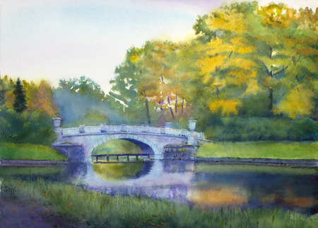 autumn landscape with a bridge and a riverの写真素材